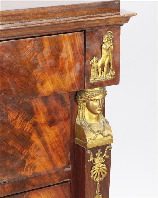 A French Empire ormolu mounted flame mahogany commode, W.4ft 1in. D.1ft 11in. H.3ft 1in.